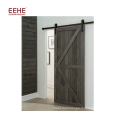 single piece main entrance wooden door with simple carving